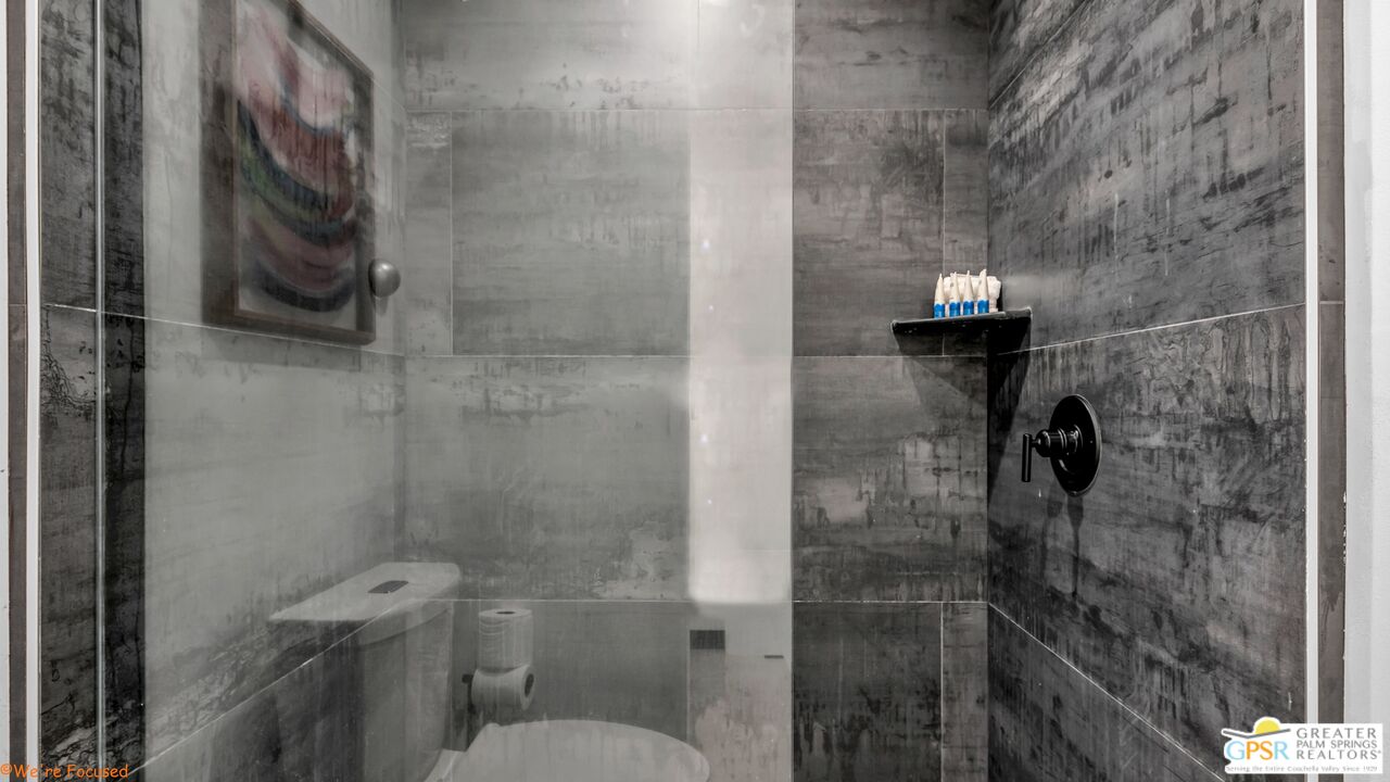 545 West Yorba Road Palm Springs, CA 92262 - Photo 22 of 72 a bathroom with a toilet and a shower