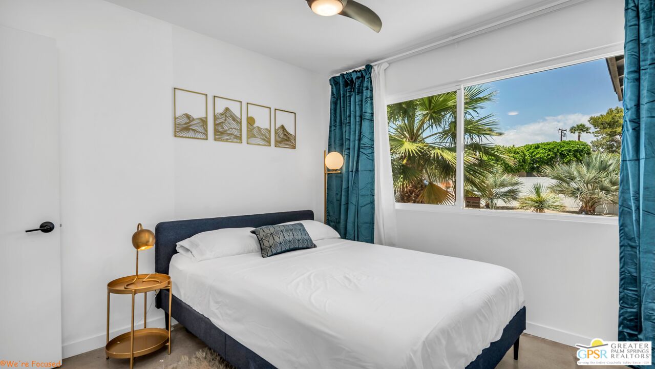 545 West Yorba Road Palm Springs, CA 92262 - Photo 25 of 72 a bedroom with a bed and a window
