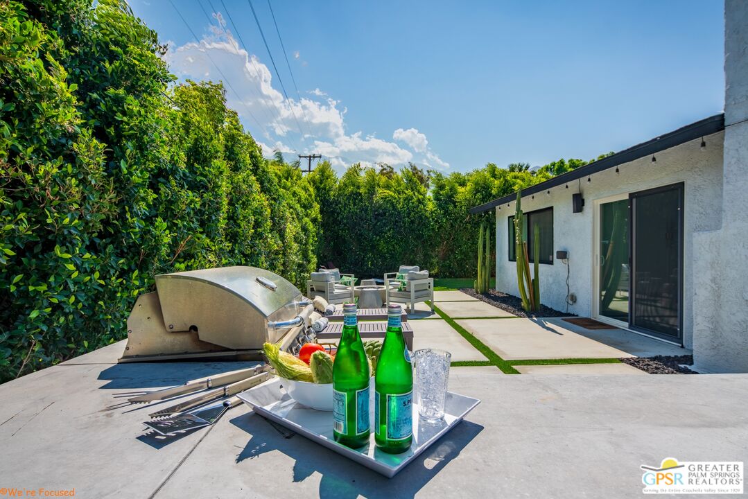 545 West Yorba Road Palm Springs, CA 92262 - Photo 50 of 72 a view of backyard with swimming pool and outdoor seating