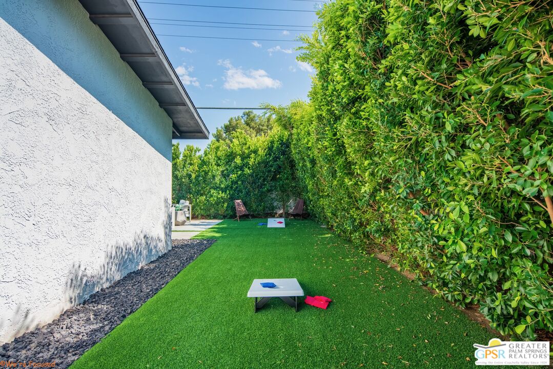545 West Yorba Road Palm Springs, CA 92262 - Photo 58 of 72 a backyard of a house with lots of green space