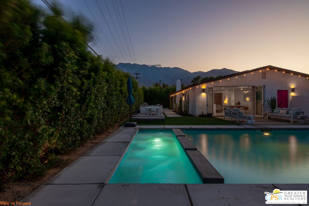 545 West Yorba Road Palm Springs, CA 92262 - Photo 64 of 72 a view of swimming pool with a house in the background