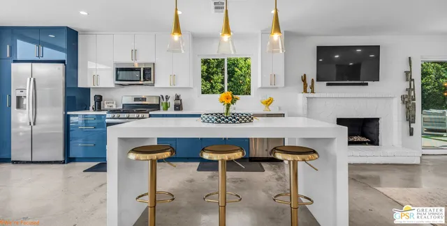 a living room with furniture fireplace and a flat screen tv