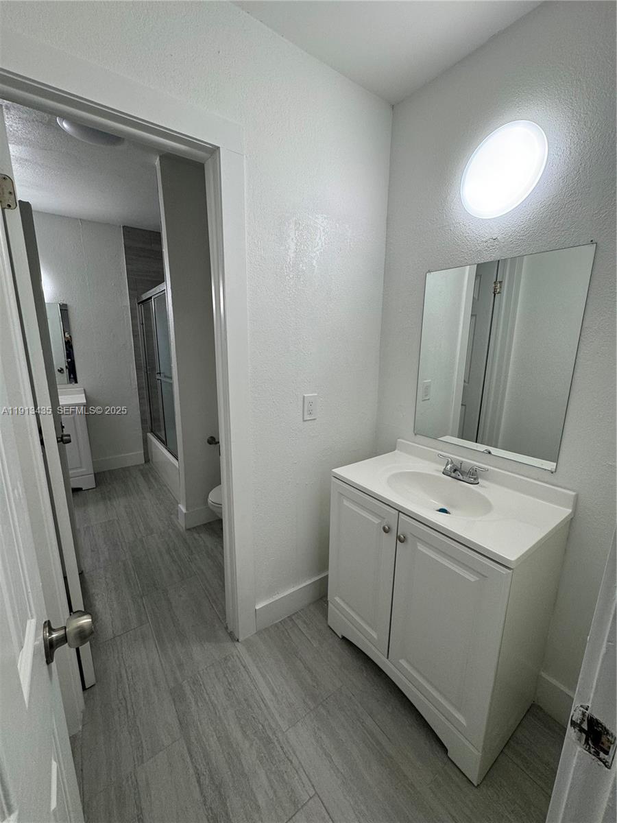 1799 Southwest 36th Avenue, Unit 1 Miami, FL 33145 - Photo 7 of 14 a view of utility room with washer and dryer