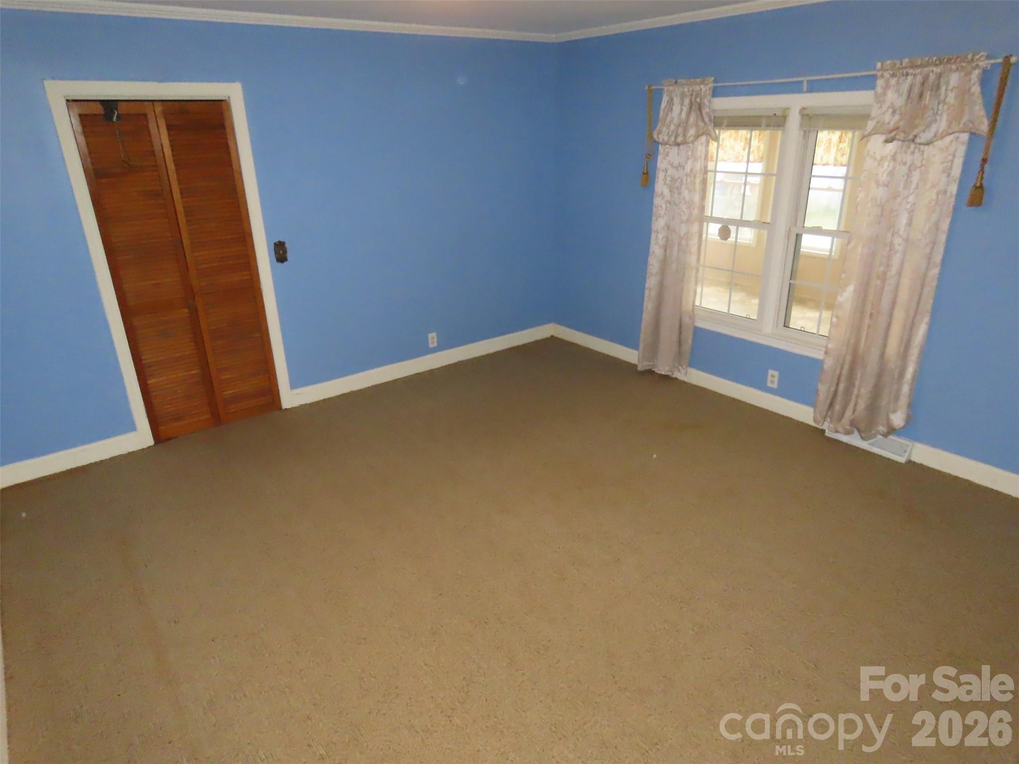 2724 Lucy Short Cut Road Marshville, NC 28103 - Photo 13 of 28 an empty room with windows