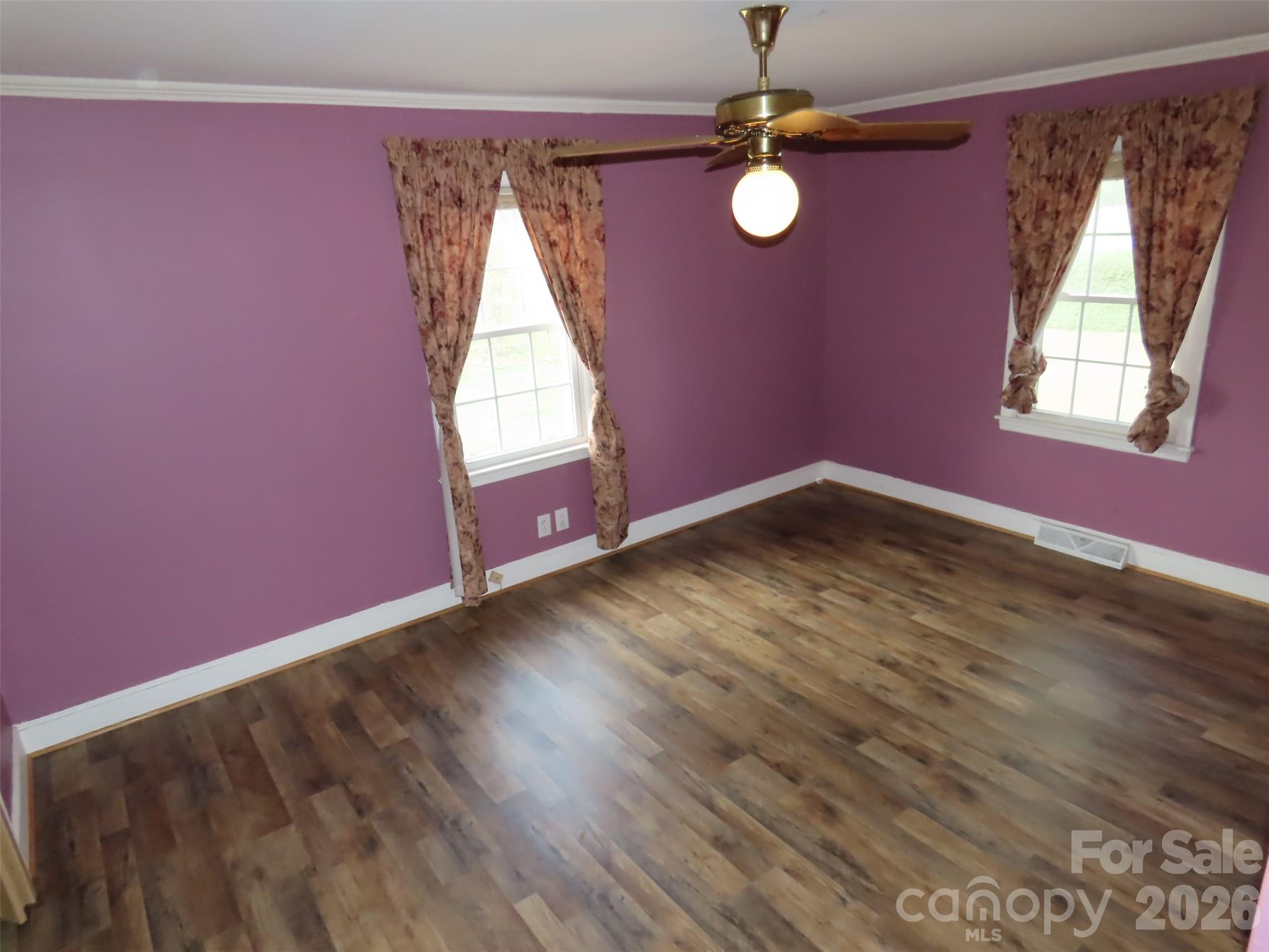 2724 Lucy Short Cut Road Marshville, NC 28103 - Photo 16 of 28 an empty room with windows