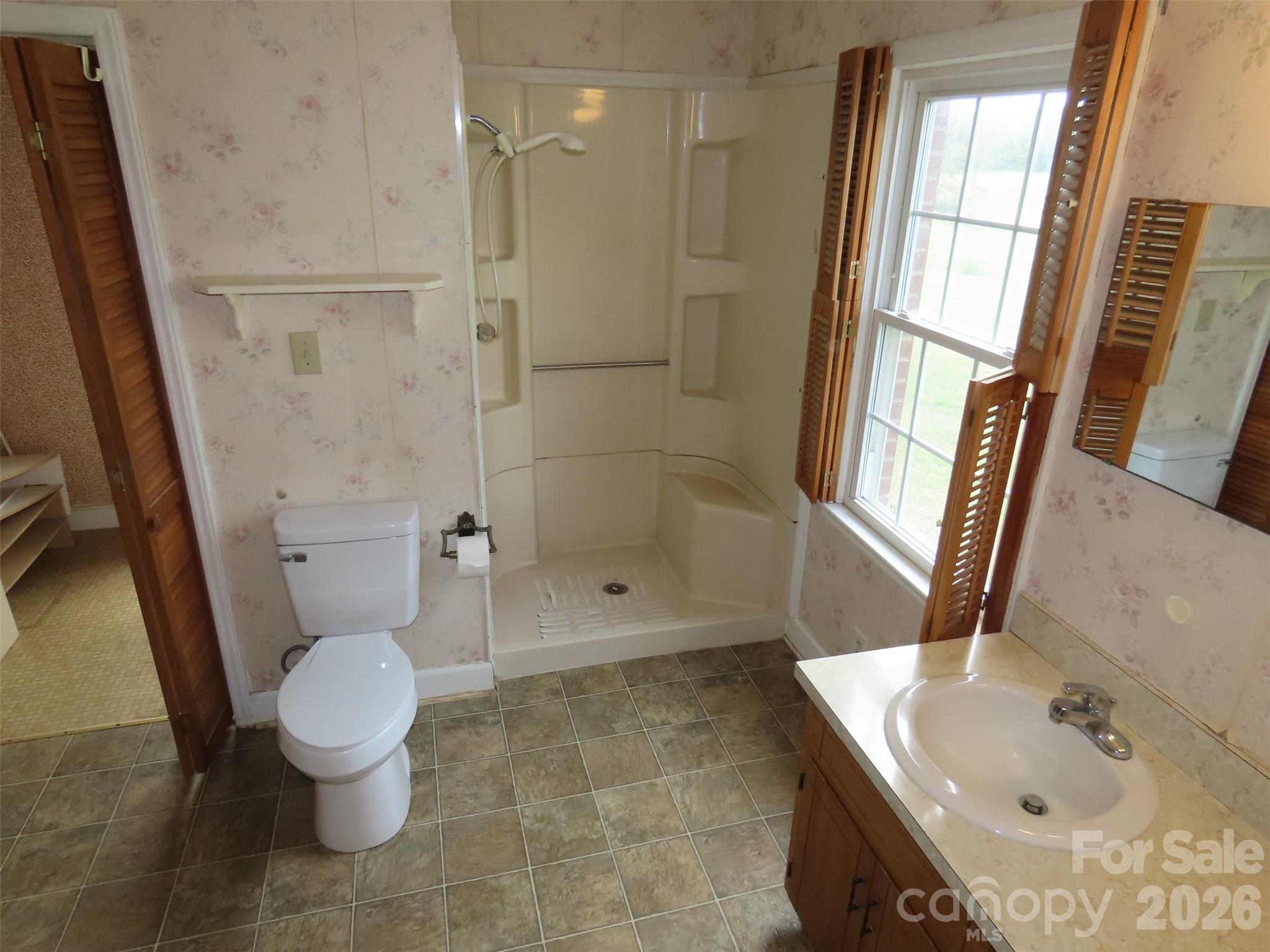 2724 Lucy Short Cut Road Marshville, NC 28103 - Photo 20 of 28 a bathroom with a bathtub and a toilet