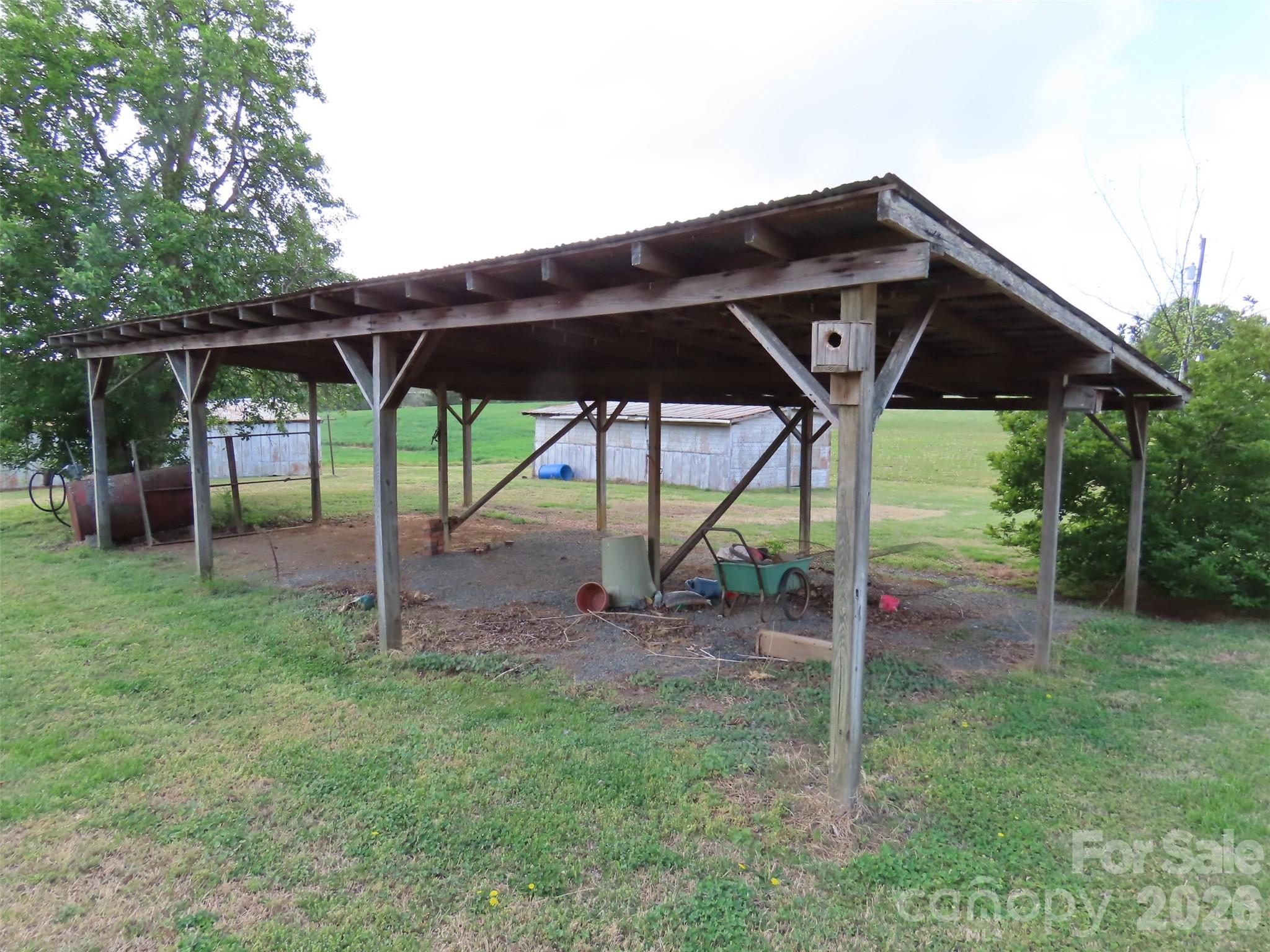 2724 Lucy Short Cut Road Marshville, NC 28103 - Photo 27 of 28 a view of a house with a yard