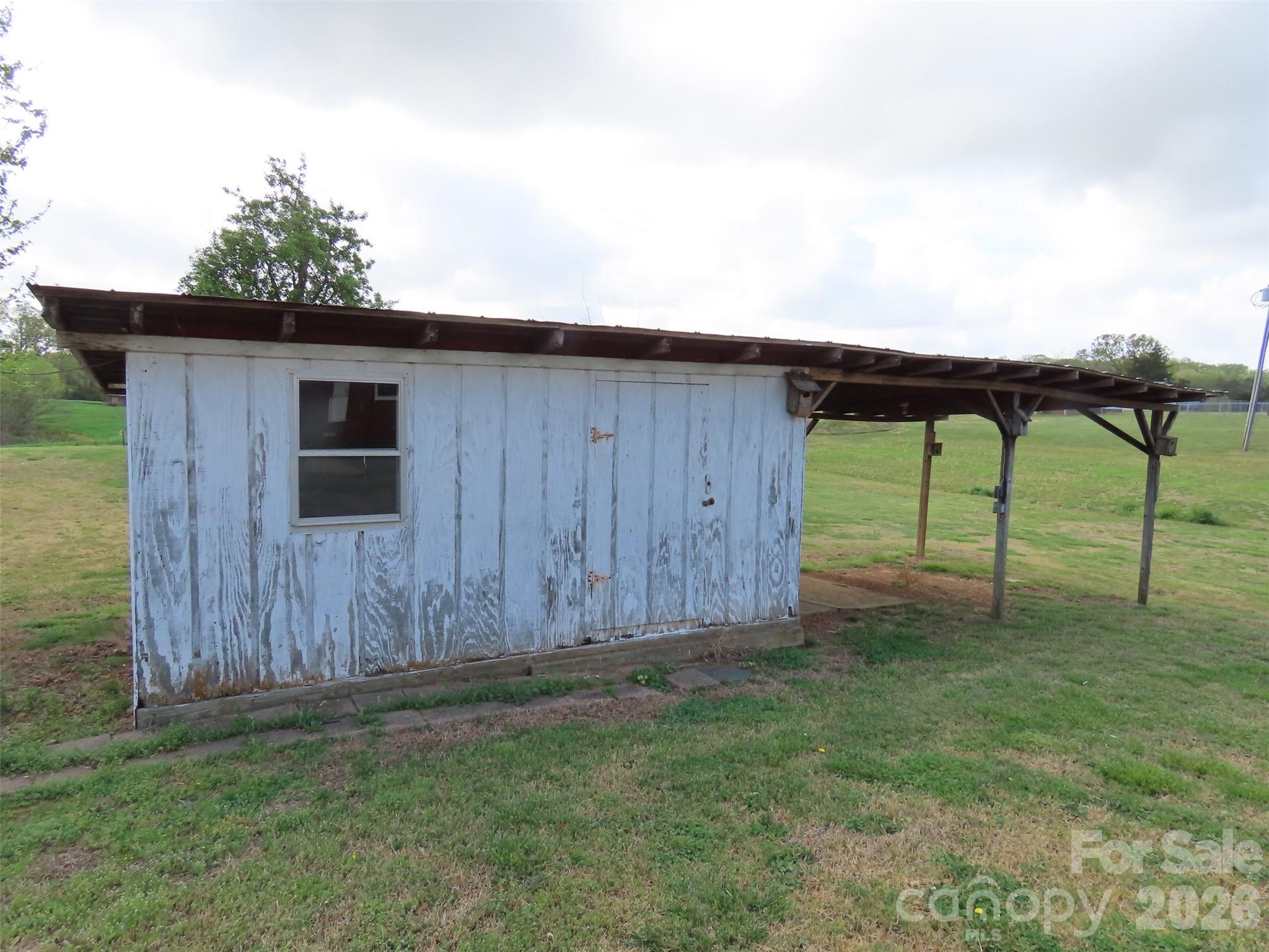 2724 Lucy Short Cut Road Marshville, NC 28103 - Photo 28 of 28 a backyard of a house