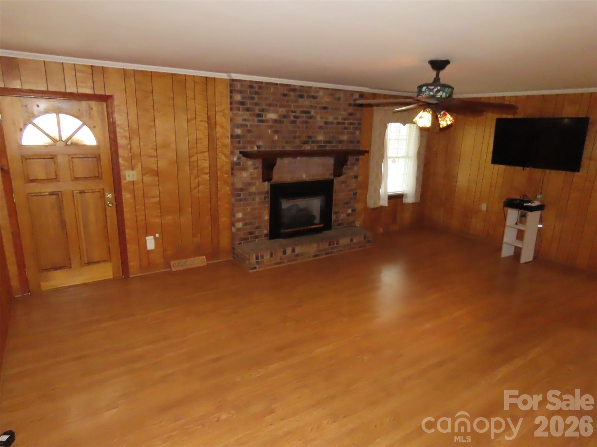 2724 Lucy Short Cut Road Marshville, NC 28103 - Photo 9 of 28 a view of a livingroom with a fireplace