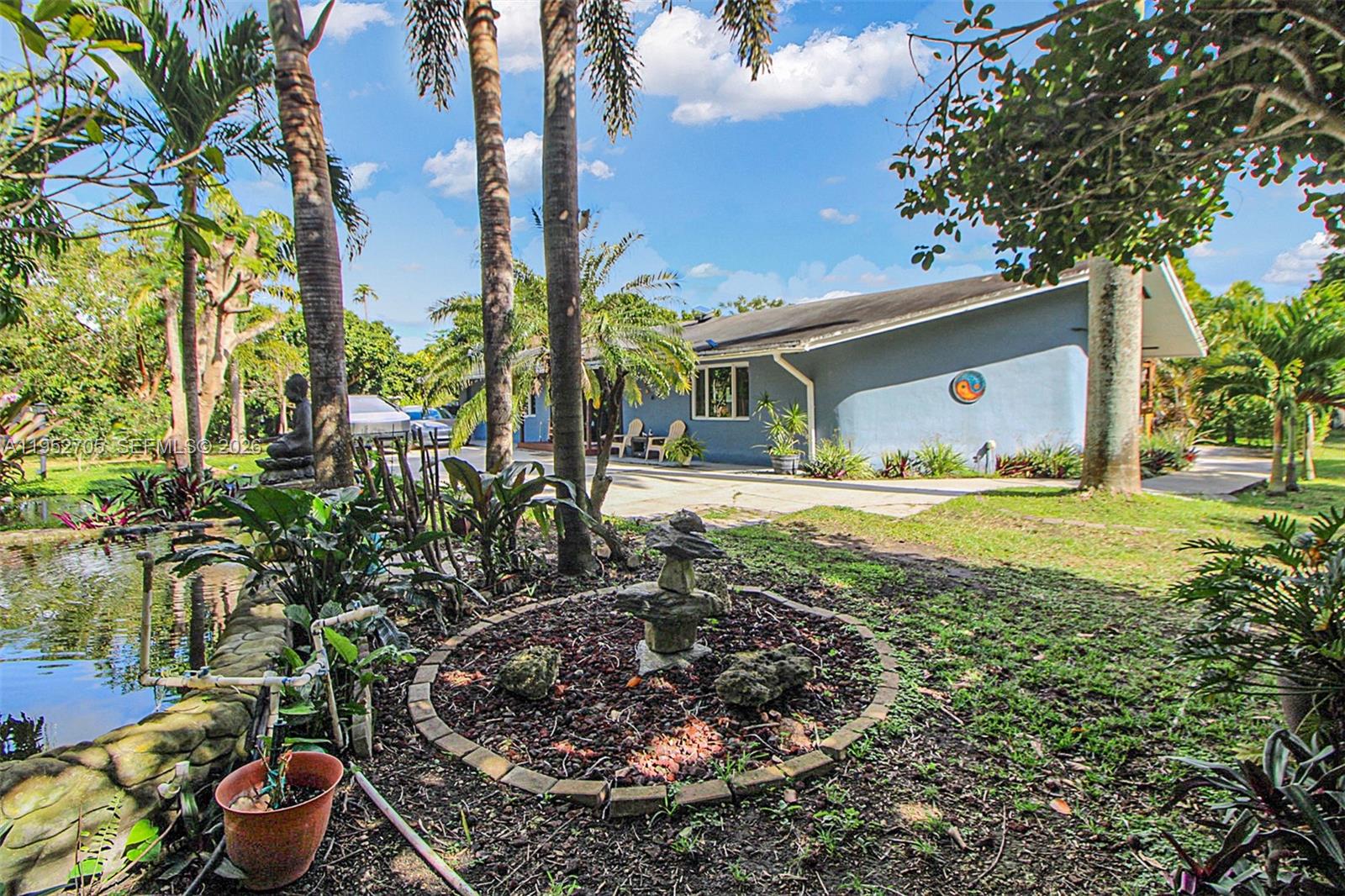 37225 Southwest 214th Avenue Homestead, FL 33034 - Photo 17 of 77 a view of outdoor space and yard