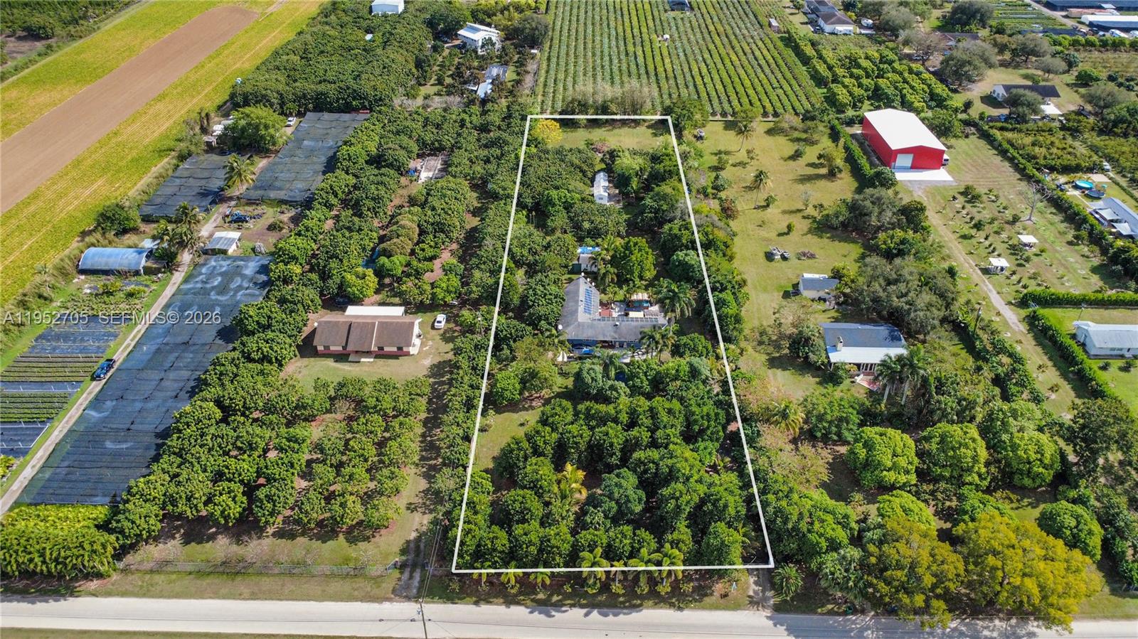 37225 Southwest 214th Avenue Homestead, FL 33034 - Photo 3 of 77 a bird view of a garden