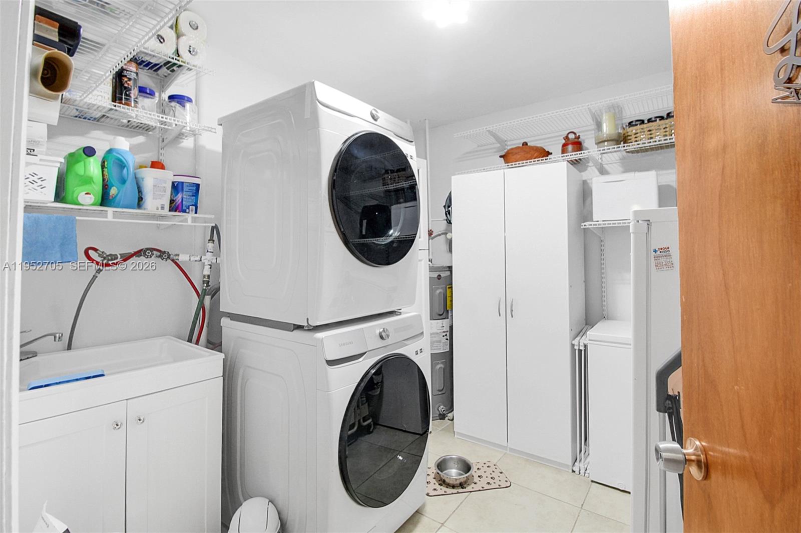 37225 Southwest 214th Avenue Homestead, FL 33034 - Photo 60 of 77 a utility room with dryer and washer