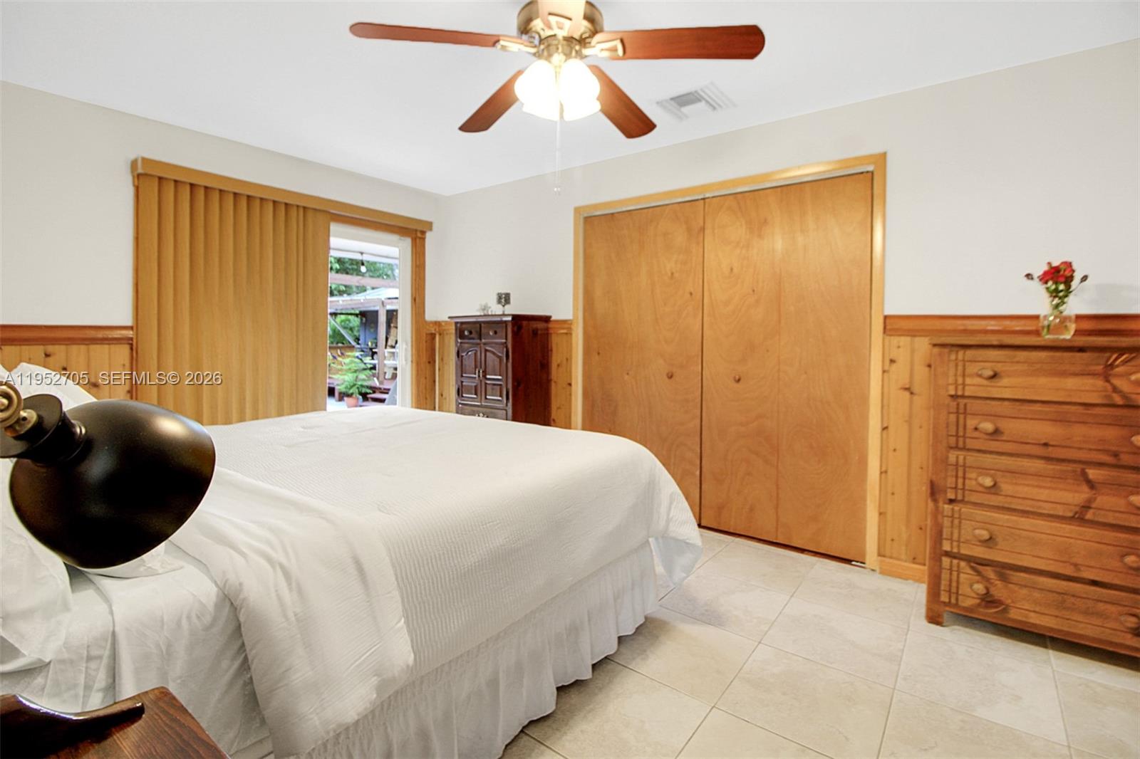 37225 Southwest 214th Avenue Homestead, FL 33034 - Photo 66 of 77 a bedroom with a bed and window