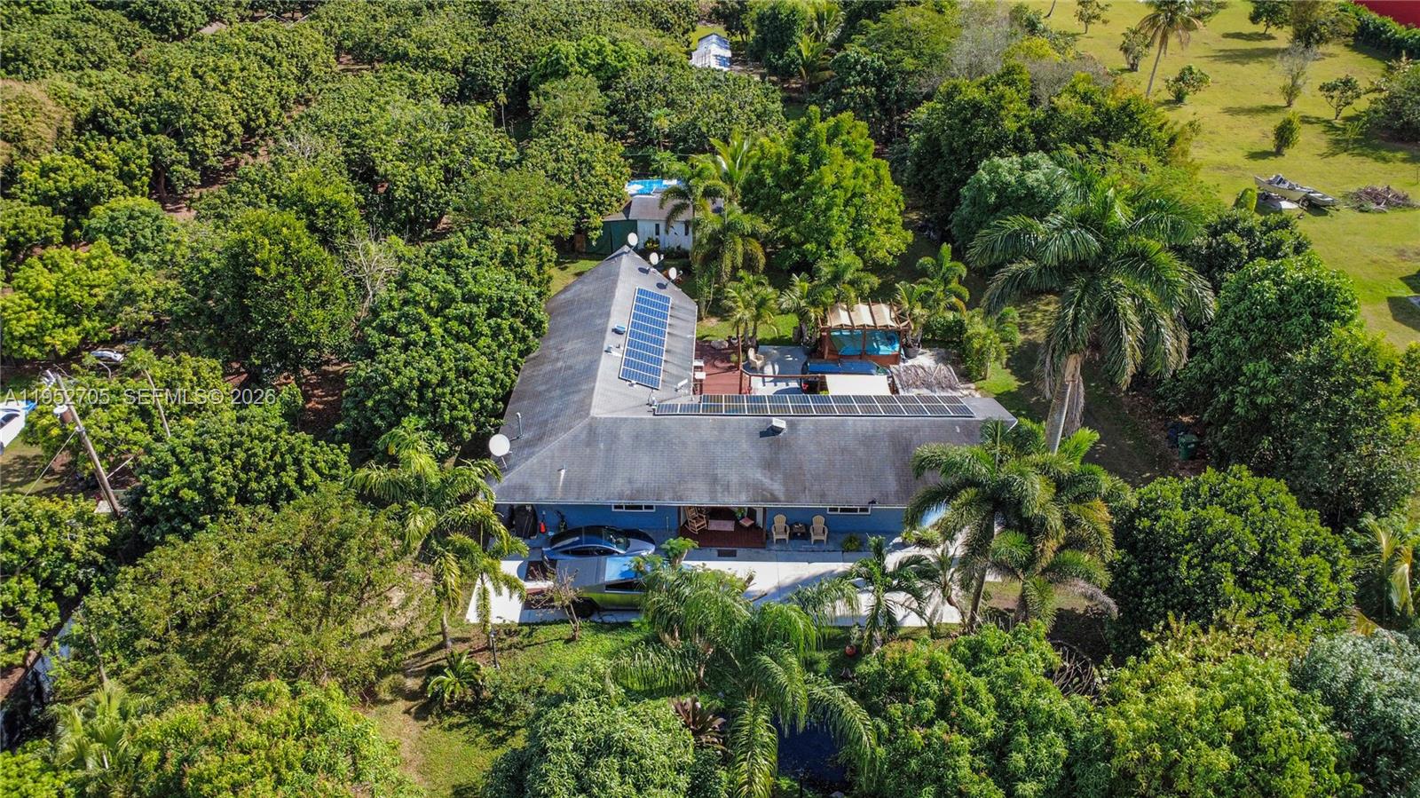 37225 Southwest 214th Avenue Homestead, FL 33034 - Photo 69 of 77 an aerial view of a house with balcony