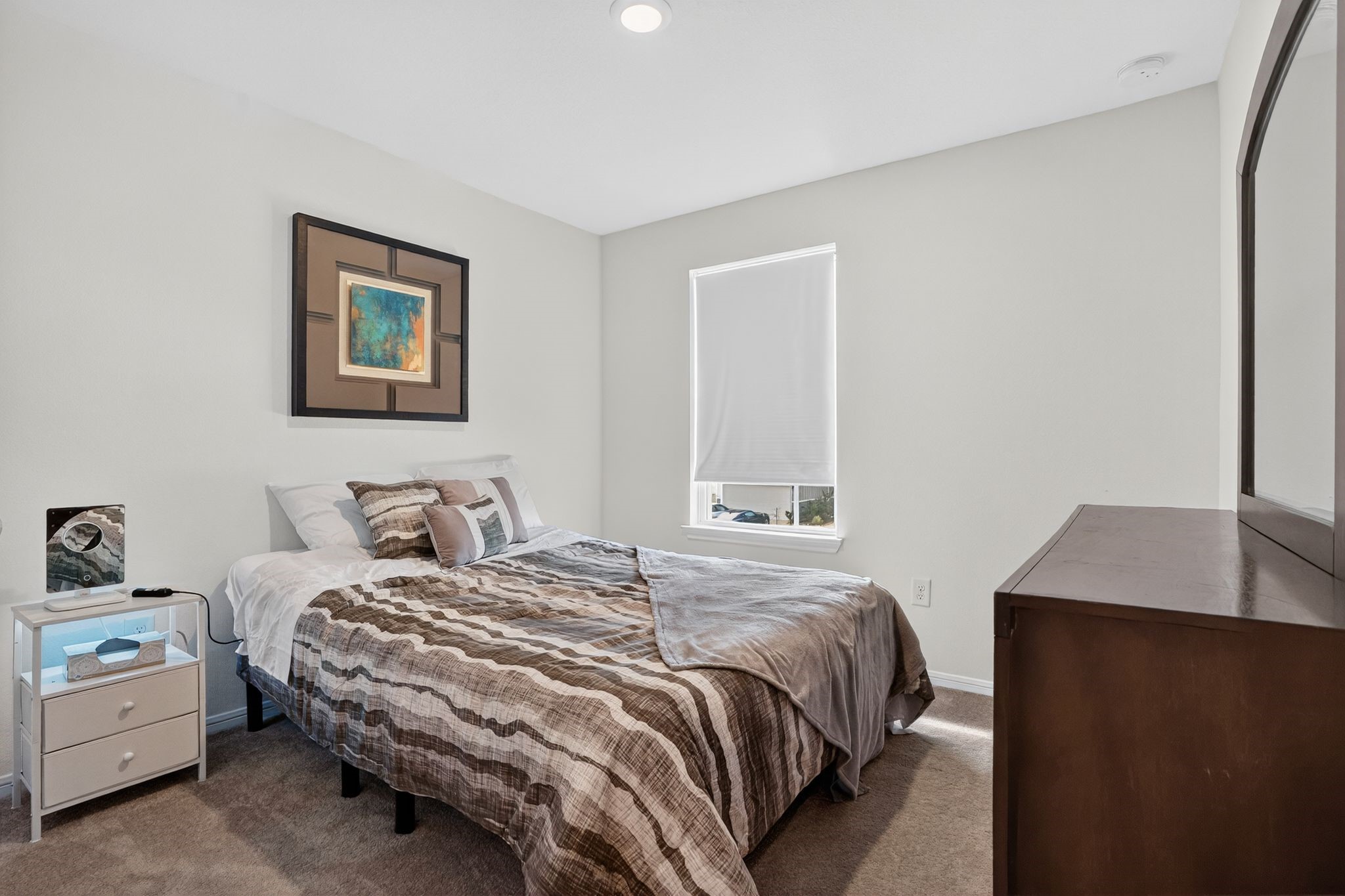 17866 Juneberry Seed Street Hockley, TX 77447 - Photo 14 of 26 a bedroom with a bed and a desk