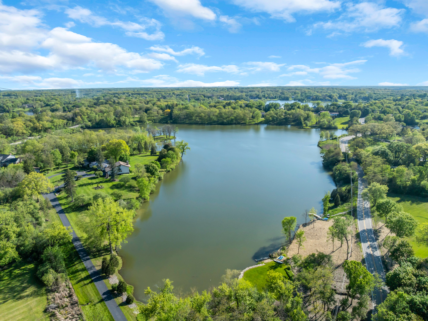 32 Otis Road Barrington Hills, IL 60010 - Photo 45 of 48 a view of a lake with a city