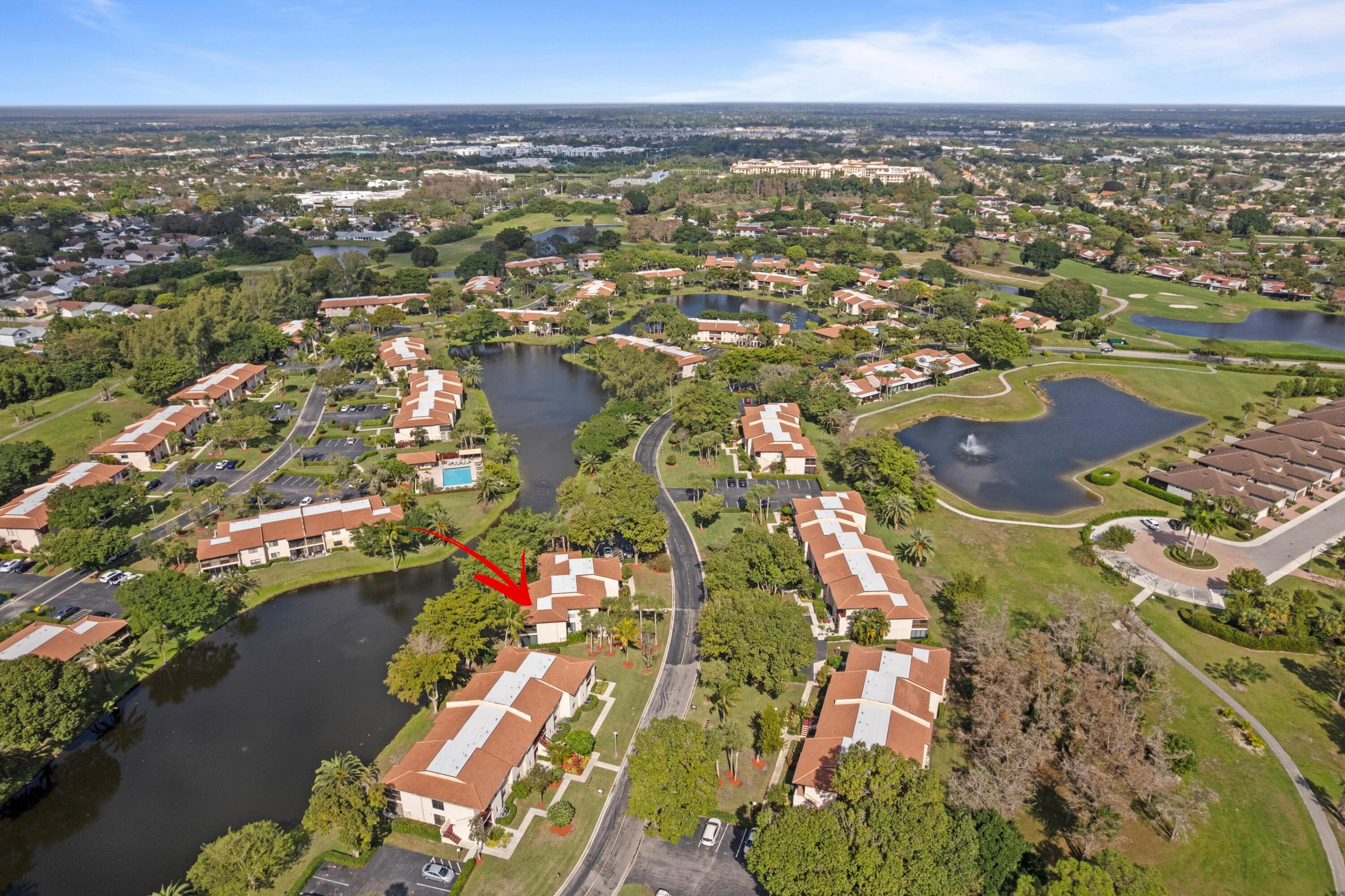 9265 Vista Del Lago, Unit 41B Boca Raton, FL 33428 - Photo 26 of 42 an aerial view of residential houses with outdoor space