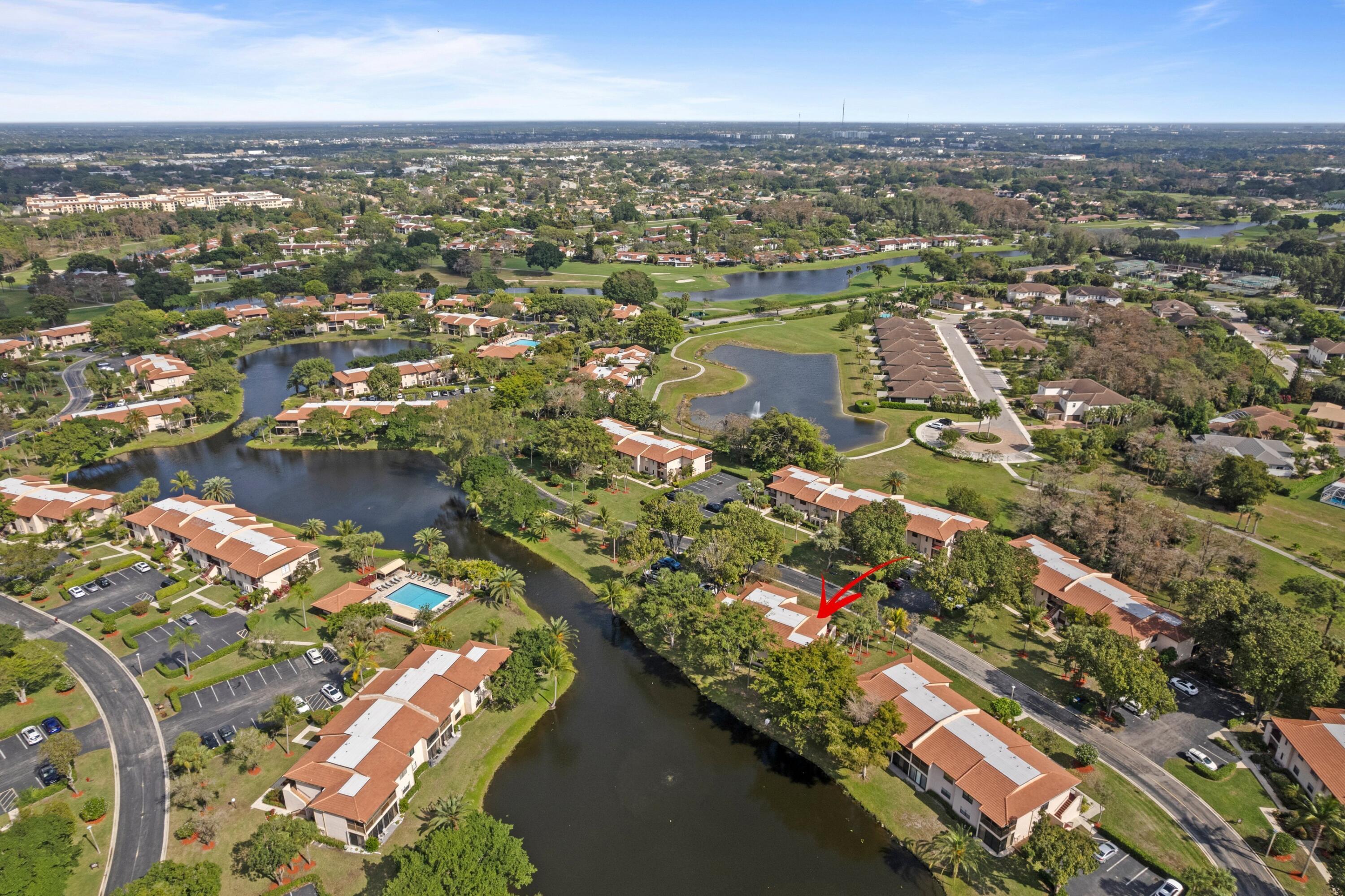 9265 Vista Del Lago, Unit 41B Boca Raton, FL 33428 - Photo 3 of 42 an aerial view of residential houses with outdoor space