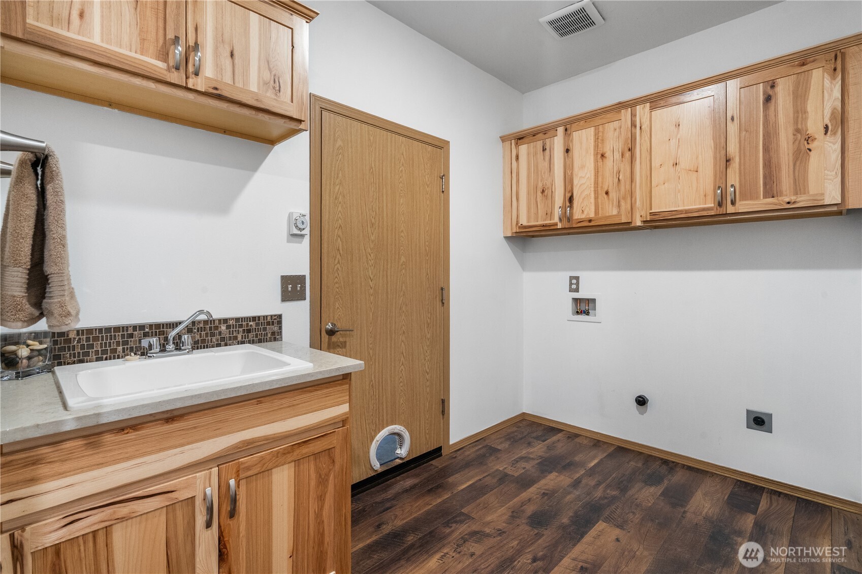 15840 Lawrence Lake Road Southeast Yelm, WA 98597 - Photo 26 of 40 a bathroom with a sink and a mirror