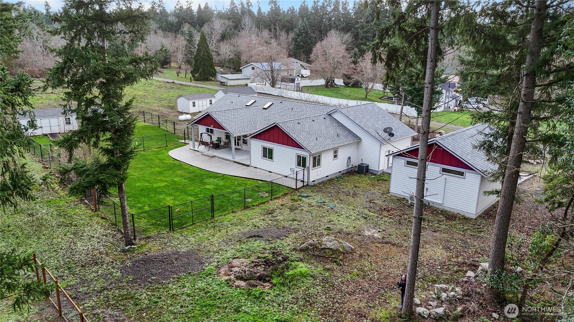15840 Lawrence Lake Road Southeast Yelm, WA 98597 - Photo 32 of 40 a aerial view of a house with a yard
