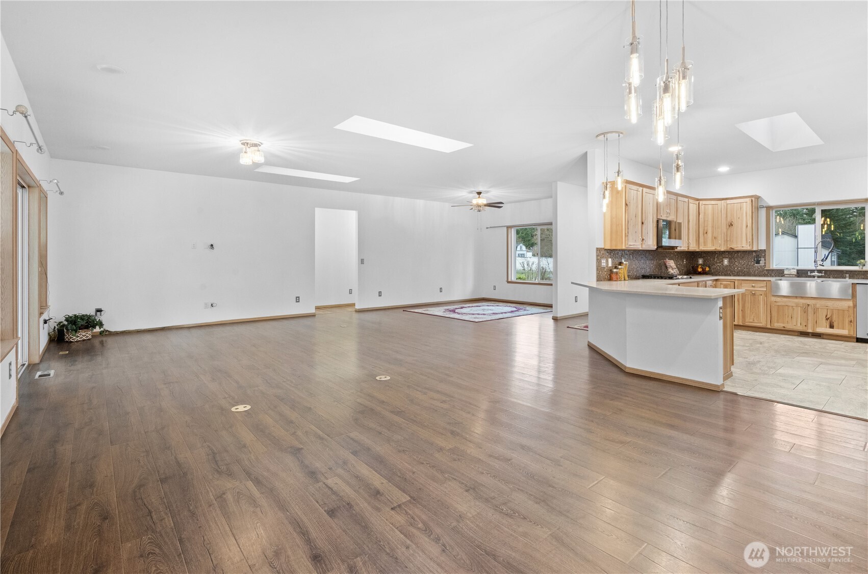 15840 Lawrence Lake Road Southeast Yelm, WA 98597 - Photo 8 of 40 a view of a kitchen with stove and cabinets