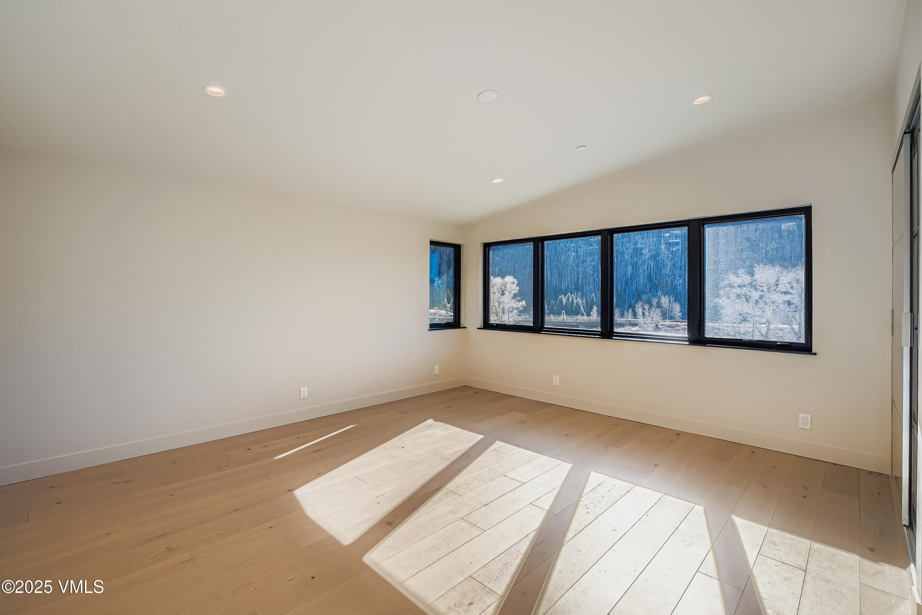 2811 Bald Mountain Road Vail, CO 81657 - Photo 39 of 59 a view of an empty room with a window