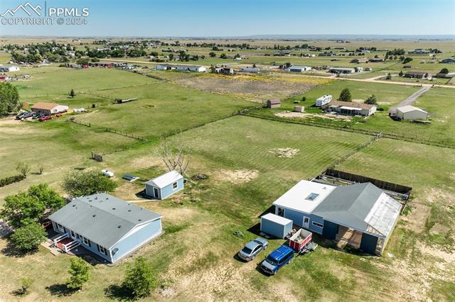 5845 Peerless Farms Road Peyton, CO 80831 - Photo 4 of 50 Birds eye view of property featuring a rural view