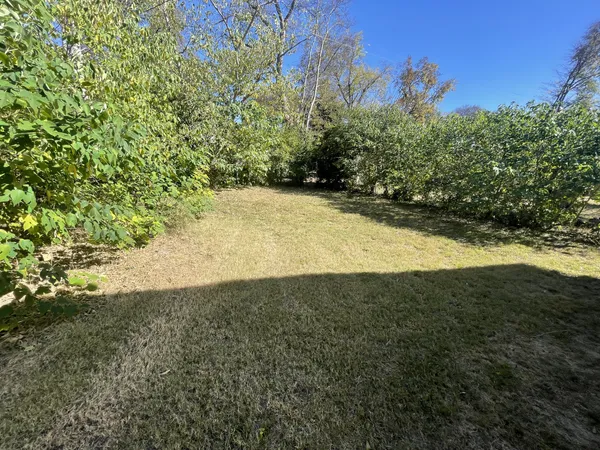 a view of outdoor space and yard