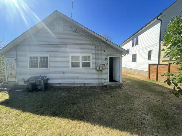 a house view with a backyard space