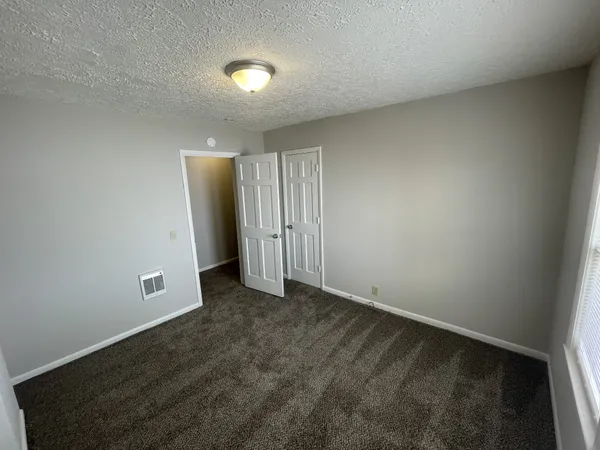 an empty room with an entryway