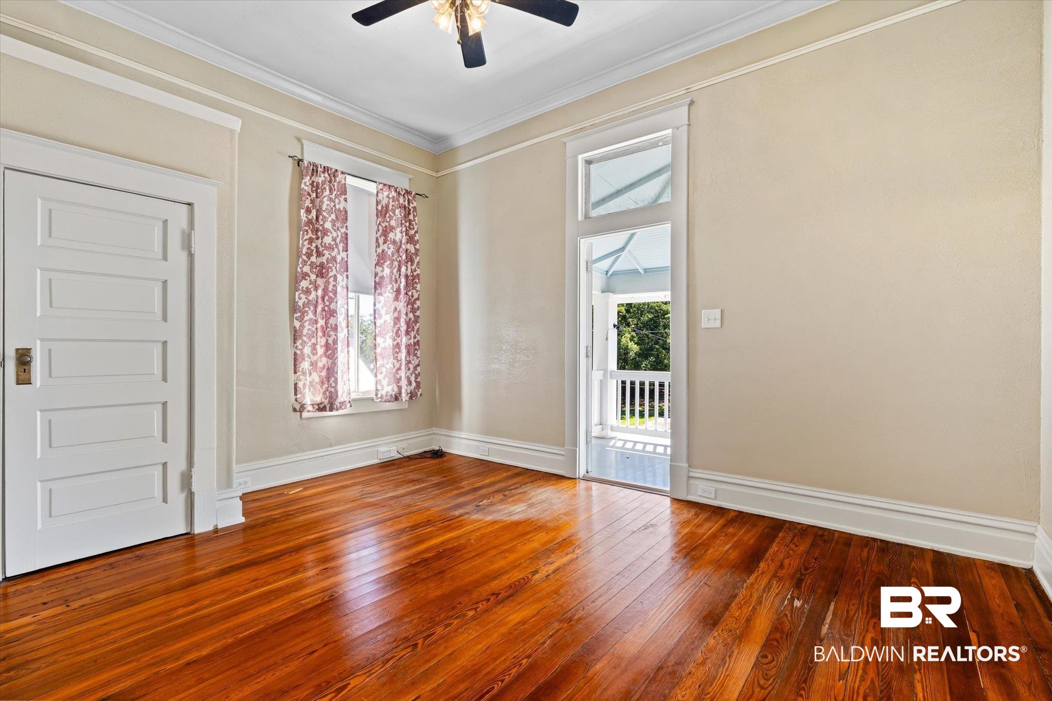1310 Brown Street Mobile, AL 36604 - Photo 13 of 18 Foyer entrance featuring ornamental molding, dark hardwood / wood-style floors, and ceiling fan