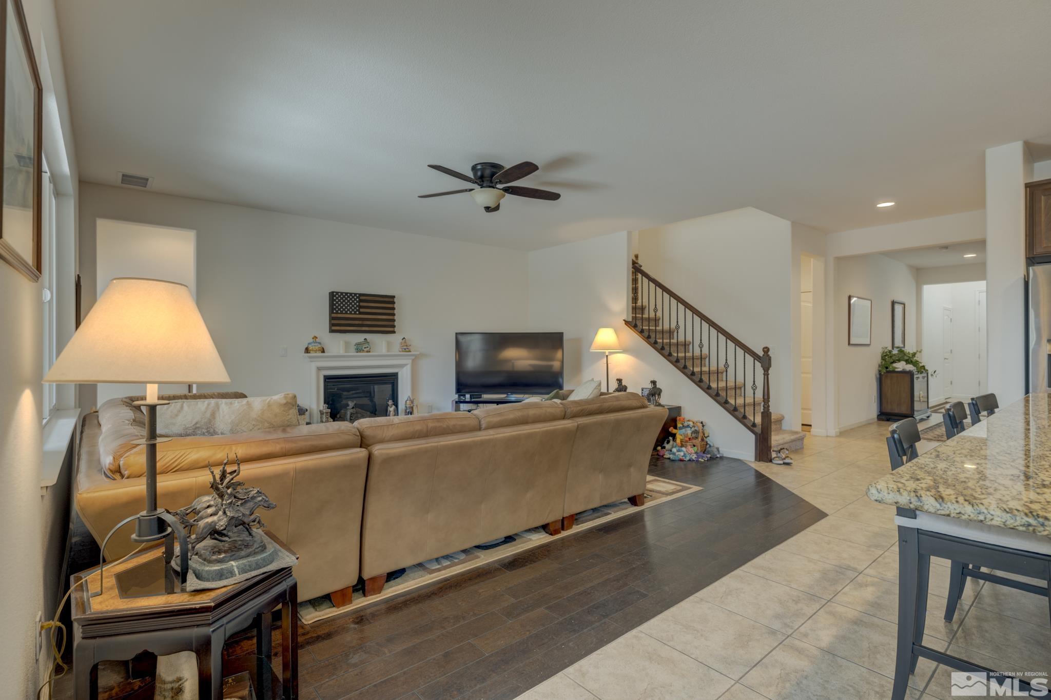 1990 Horse Prairie Road Reno, NV 89521 - Photo 3 of 12 a living room with furniture and a flat screen tv
