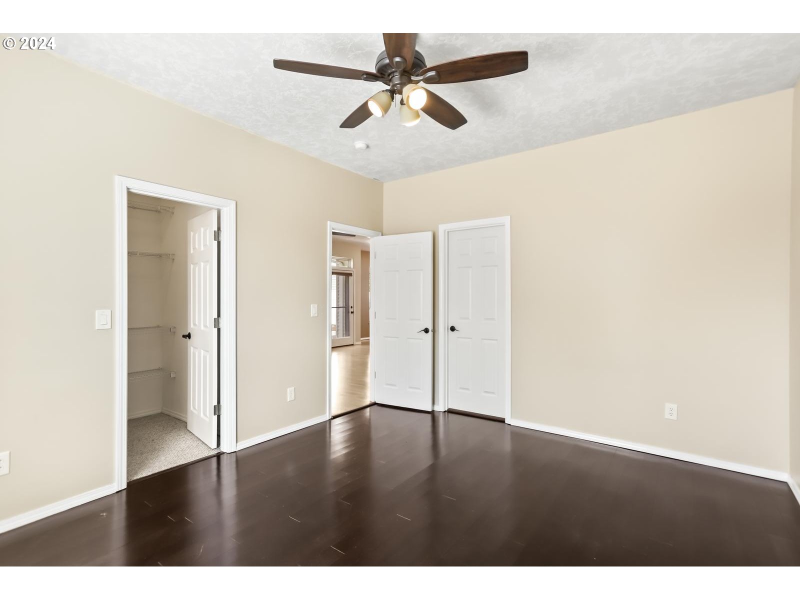 18283 Davis Street Sandy, OR 97055 - Photo 19 of 42 a view of an empty room with wooden floor