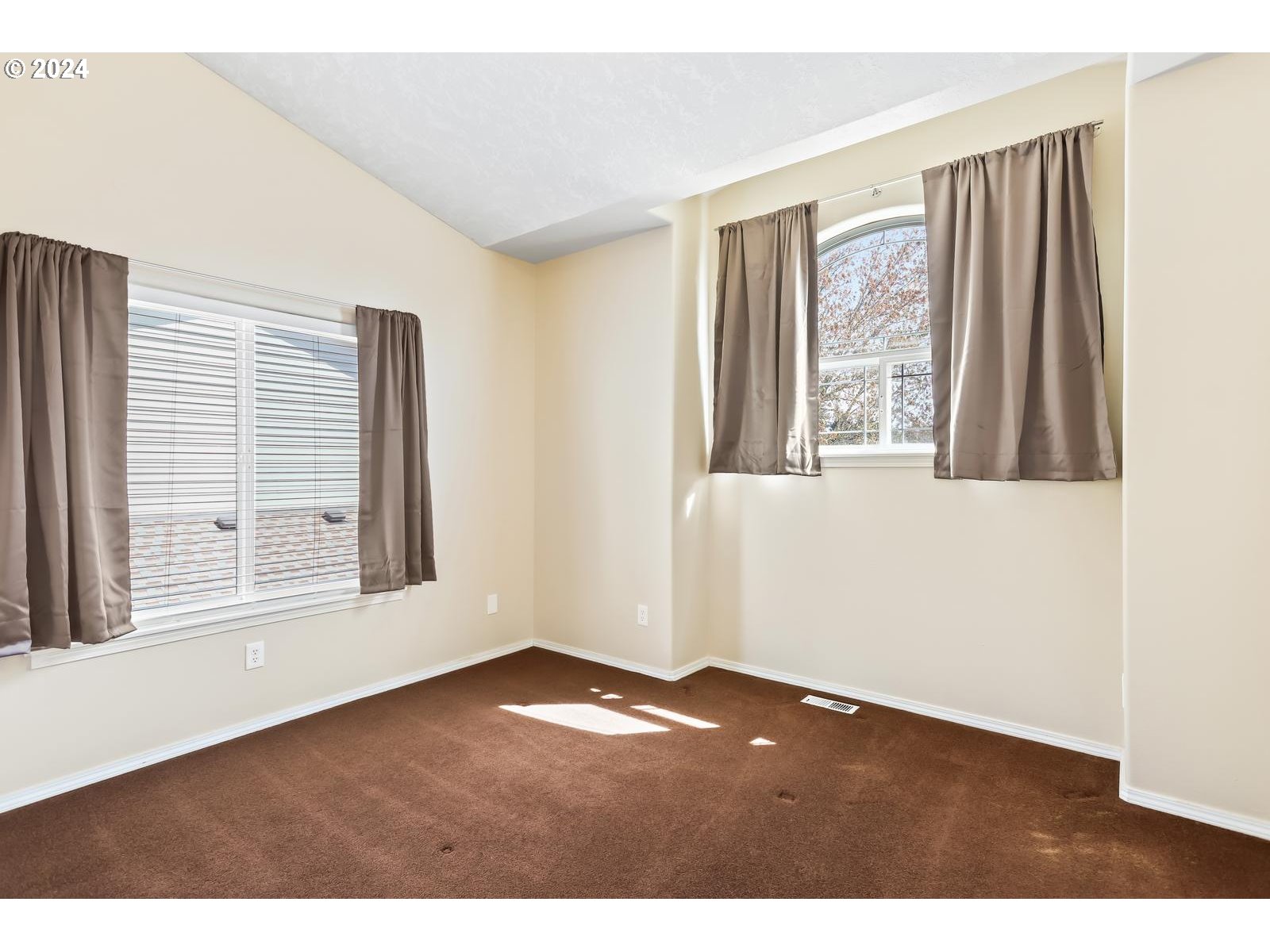 18283 Davis Street Sandy, OR 97055 - Photo 27 of 42 an empty room with wooden floor and windows