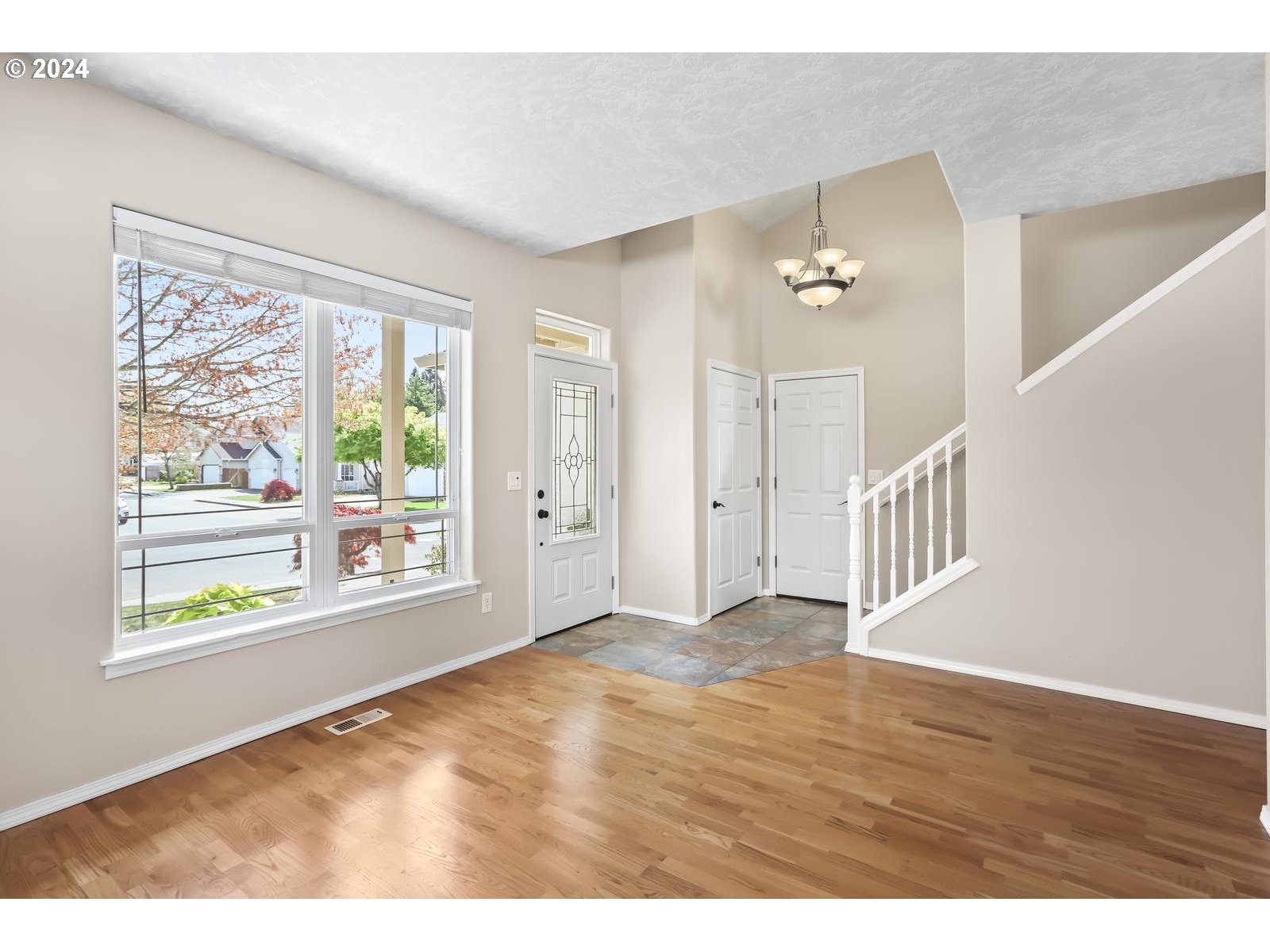 18283 Davis Street Sandy, OR 97055 - Photo 6 of 42 a view of an empty room with a window