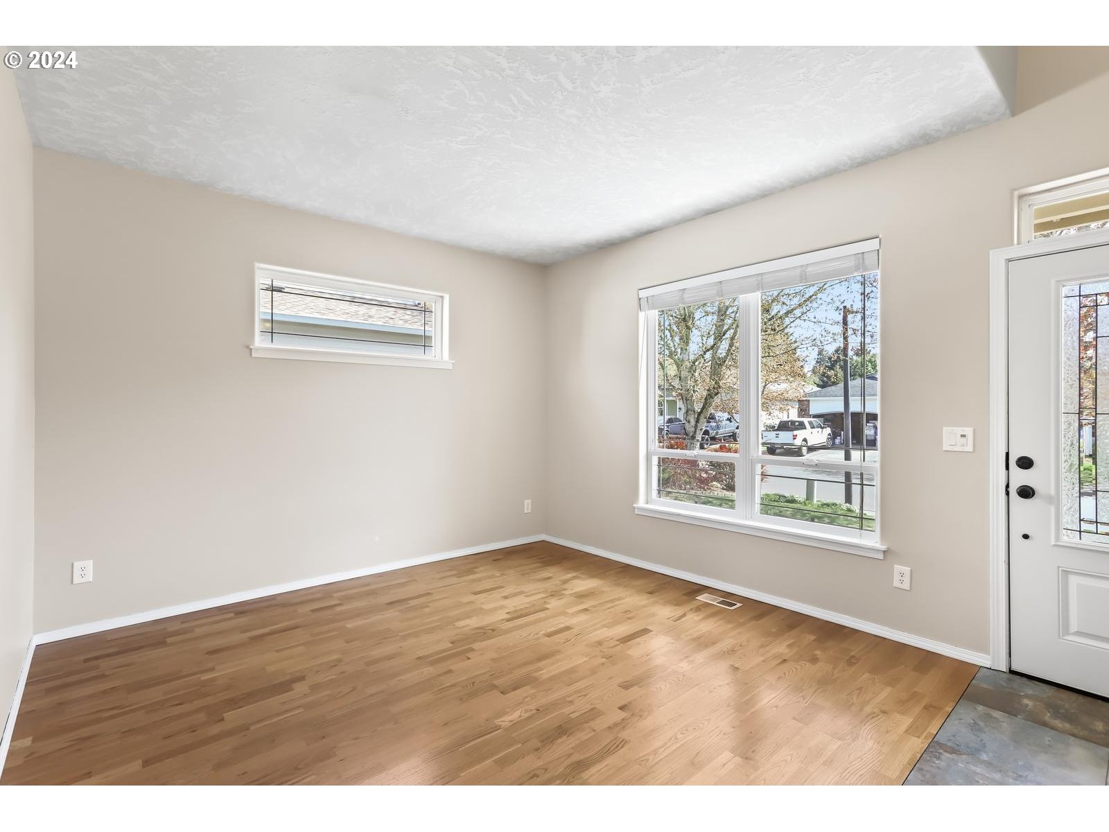 18283 Davis Street Sandy, OR 97055 - Photo 7 of 42 a view of an empty room with a window