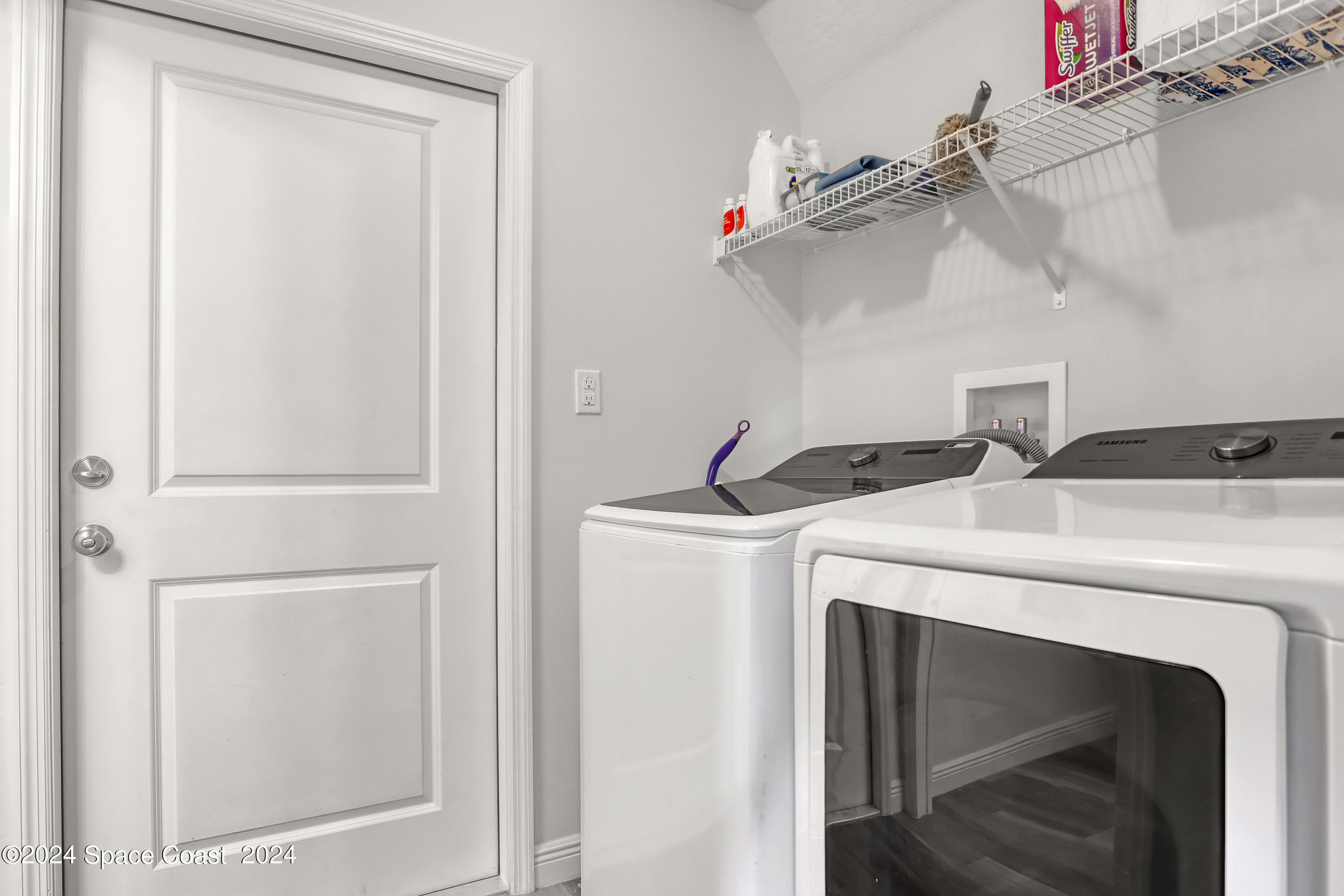 4383 Prentice Lane Mims, FL 32754 - Photo 24 of 48 a utility room with dryer and washer