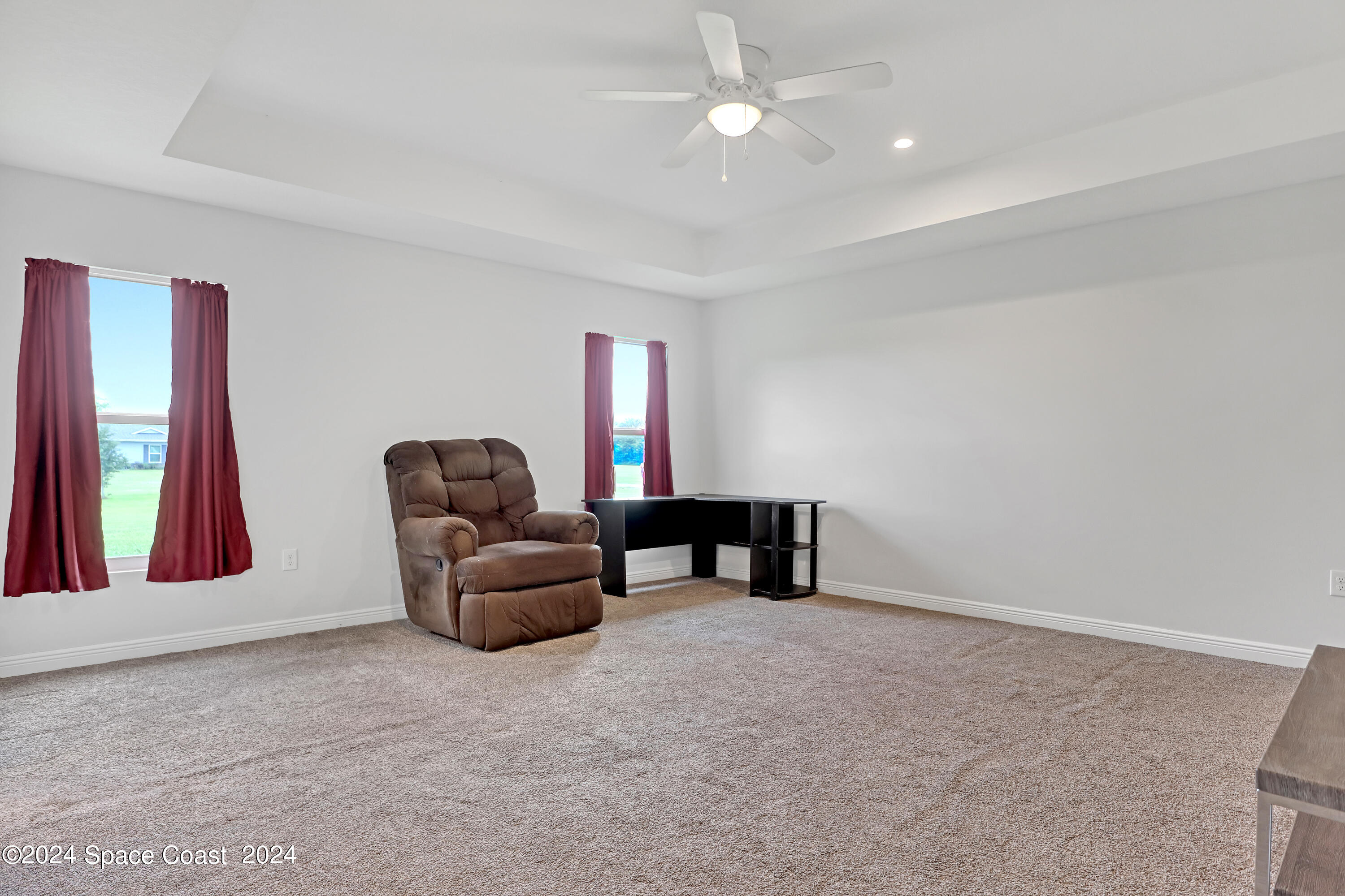4383 Prentice Lane Mims, FL 32754 - Photo 25 of 48 a living room with furniture and a ceiling fan