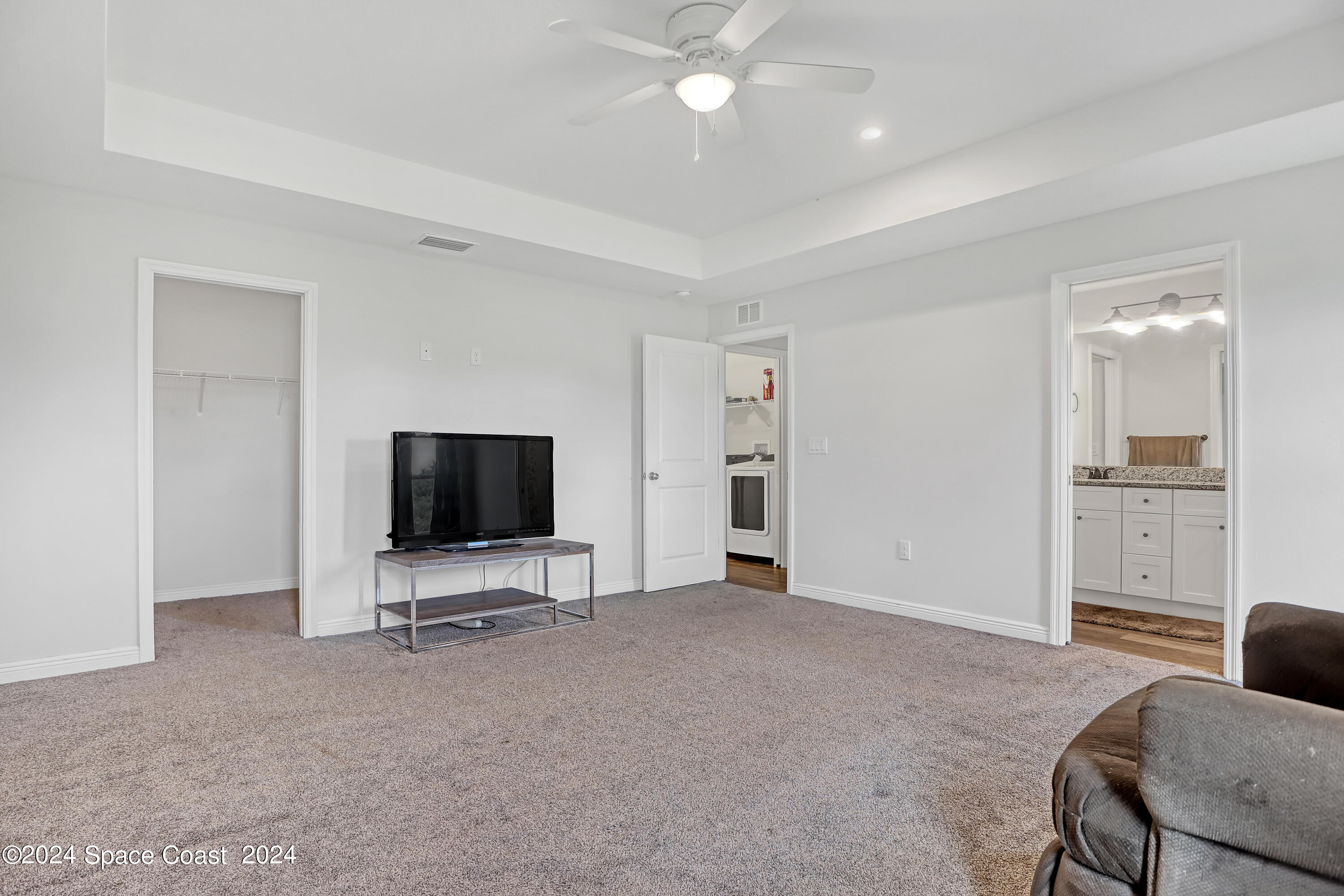 4383 Prentice Lane Mims, FL 32754 - Photo 26 of 48 a living room with furniture and a flat screen tv