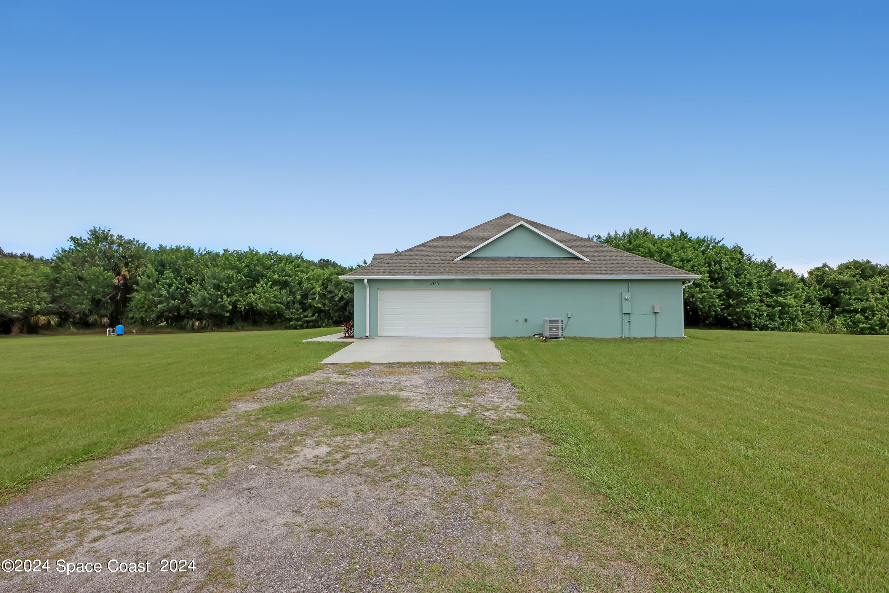 4383 Prentice Lane Mims, FL 32754 - Photo 42 of 48 a front view of a house with yard