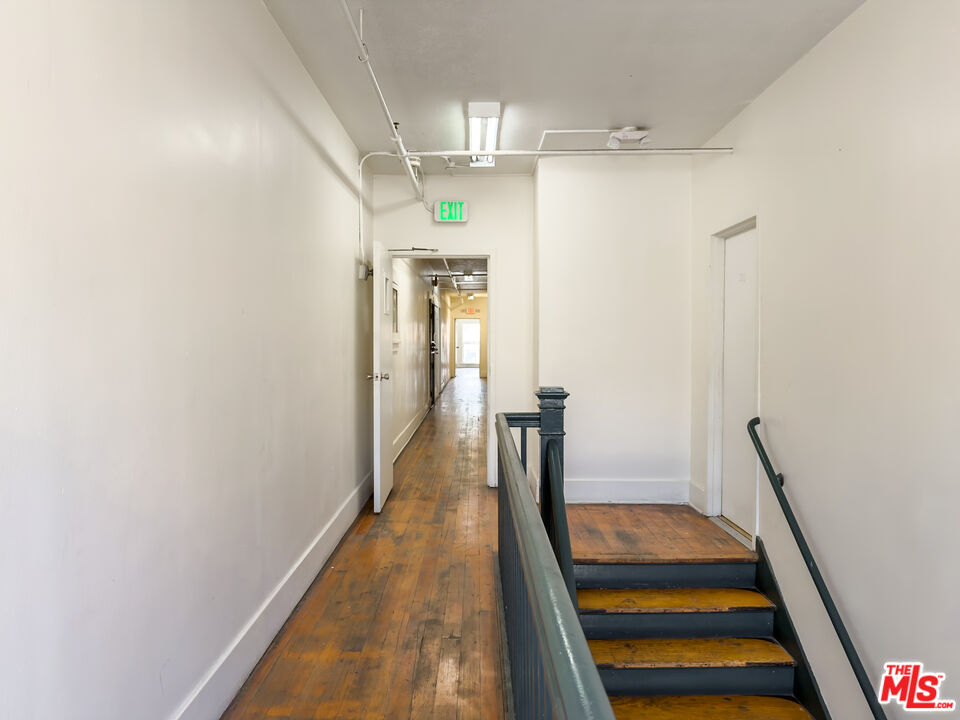 434 South Rampart Boulevard, Unit 108 Los Angeles, CA 90057 - Photo 17 of 18 a view of a hallway with a flower pot