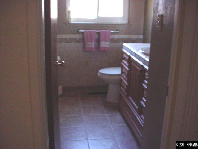 4000 Jasper Lane Reno, NV 89509 - Photo 6 of 10 a bathroom with a toilet