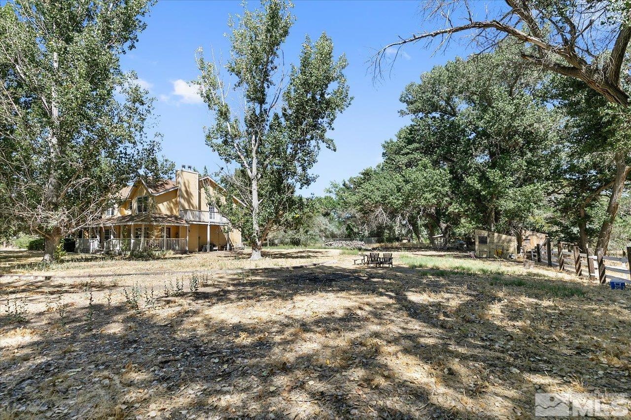5790 Hooper Place Fallon, NV 89406 - Photo 14 of 39 a view of a yard with plants and trees