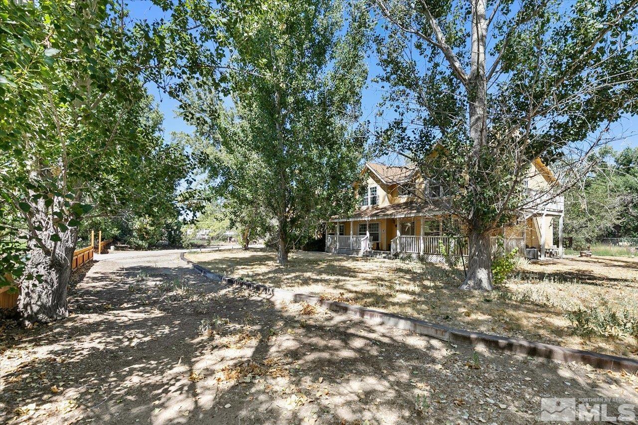 5790 Hooper Place Fallon, NV 89406 - Photo 15 of 39 a view of a house with a tree in the background