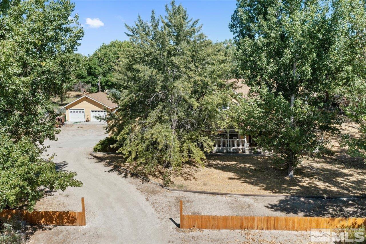 5790 Hooper Place Fallon, NV 89406 - Photo 17 of 39 a view of a yard with a tree