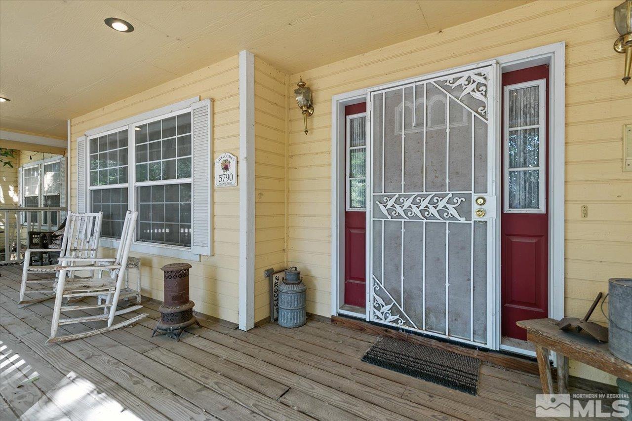 5790 Hooper Place Fallon, NV 89406 - Photo 21 of 39 an empty room with wooden floor and a window