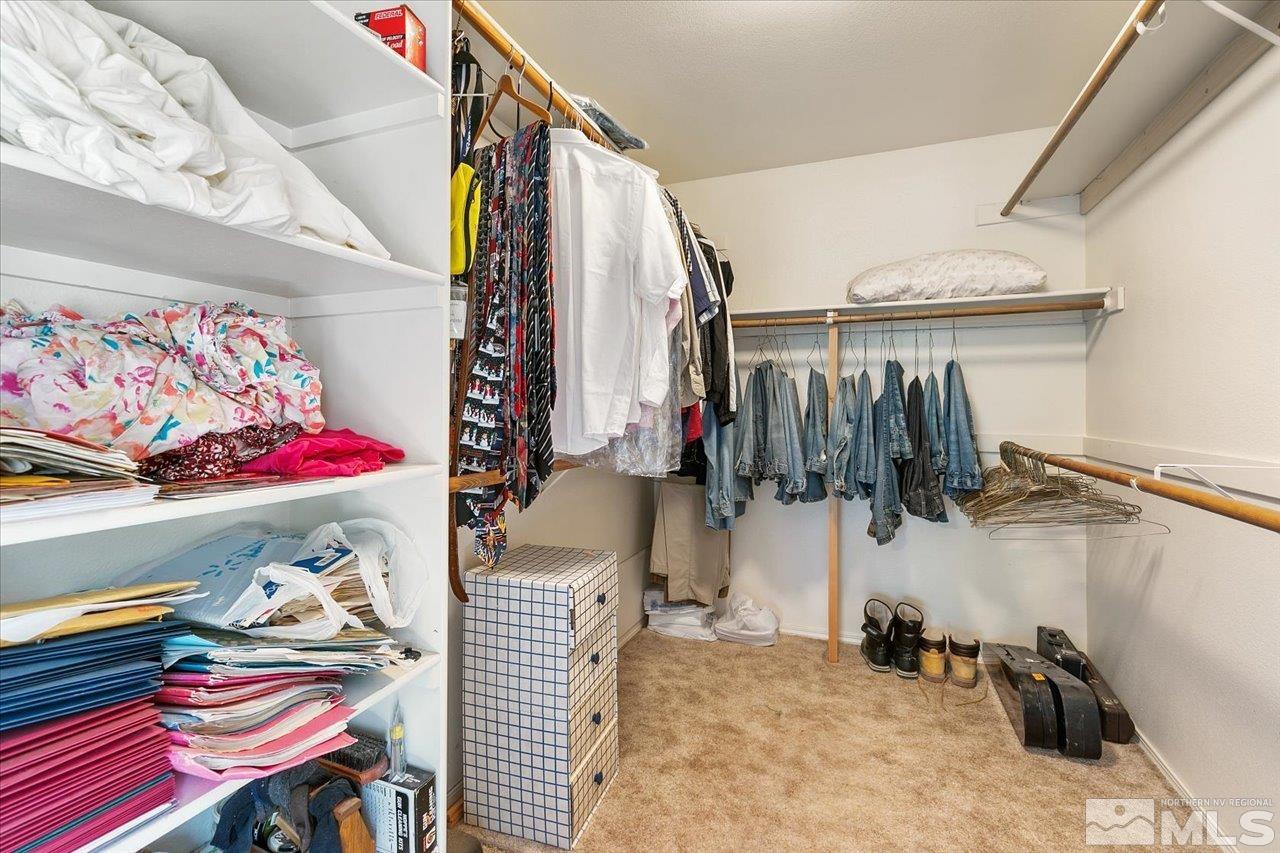 5790 Hooper Place Fallon, NV 89406 - Photo 29 of 39 a view of walk in closet with clothes and shoes