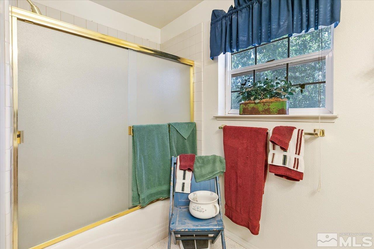 5790 Hooper Place Fallon, NV 89406 - Photo 35 of 39 a view of a dining room with furniture window and wooden floor