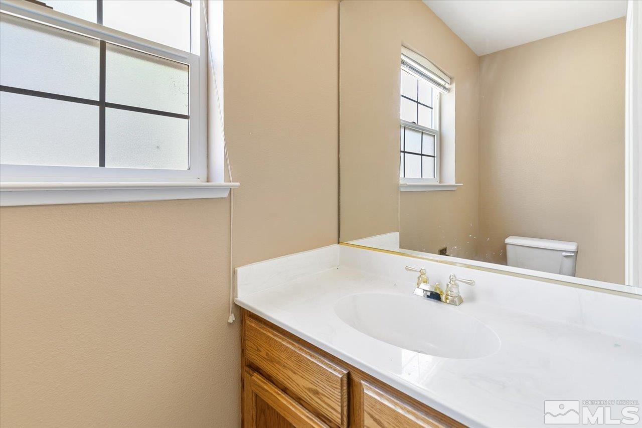 5790 Hooper Place Fallon, NV 89406 - Photo 39 of 39 a bathroom with a sink and a window