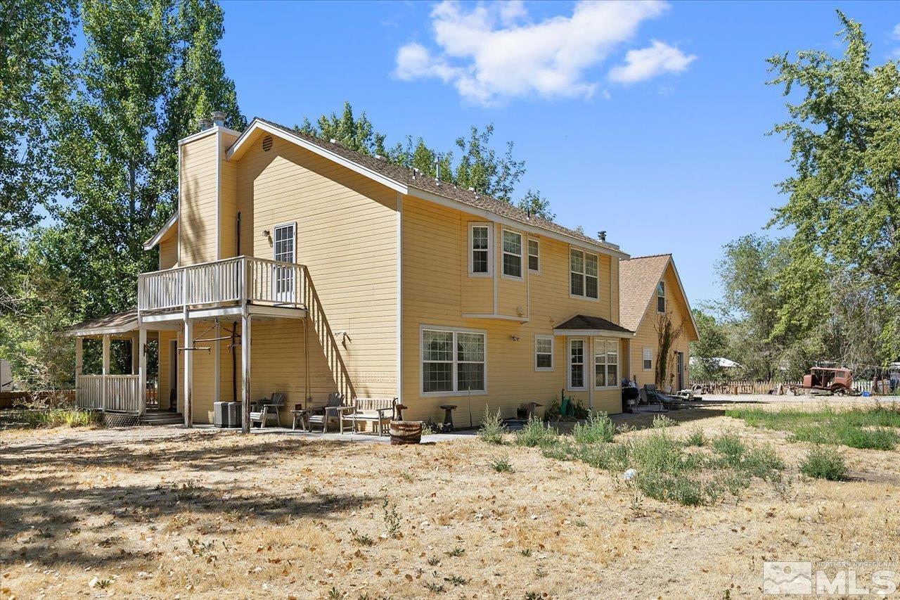 5790 Hooper Place Fallon, NV 89406 - Photo 5 of 39 a view of a house with a yard
